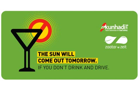 Kunhadi and Zaatar w Zeit distribute car shades for road safety